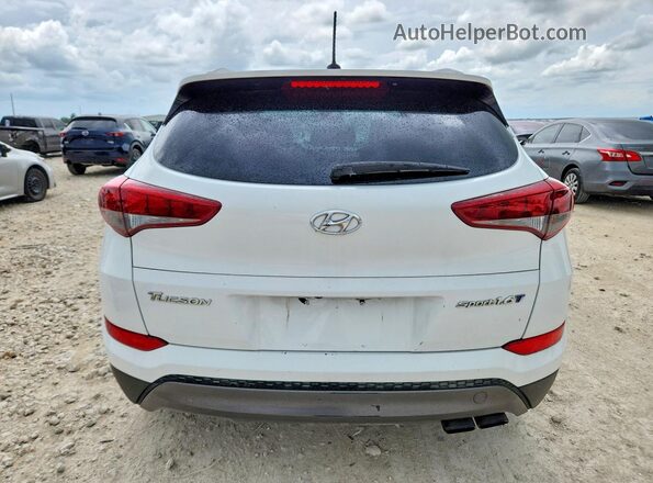 KM8J33A20GU069010 2016 HYUNDAI TUCSON White უკანა ხედი