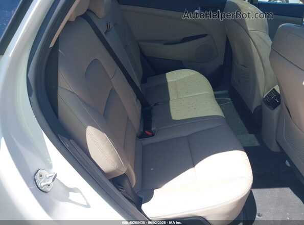 KM8J33A23GU140166 2016 HYUNDAI TUCSON White Vista de la etiqueta del VIN
