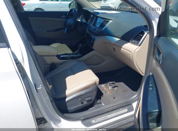 KM8J33A23GU140166 2016 HYUNDAI TUCSON White Vista interior delantera