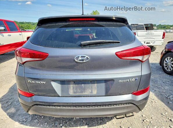 KM8J33A25GU027271 2016 HYUNDAI TUCSON Gray უკანა ხედი