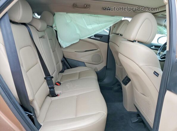 KM8J33A25GU036357 2016 HYUNDAI TUCSON Tan უკანა სალონის ხედი