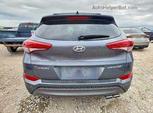KM8J33A27GU230193 2016 HYUNDAI TUCSON Charcoal უკანა ხედი