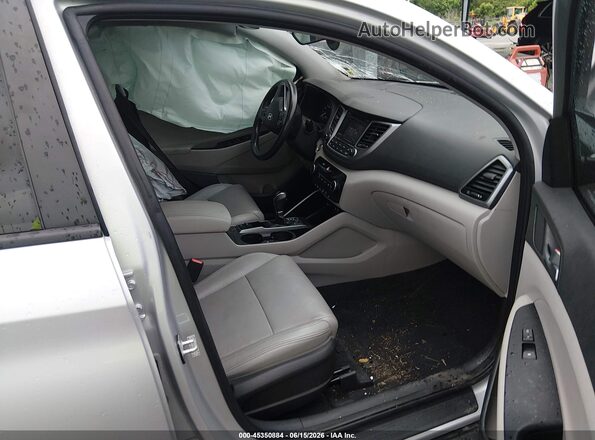 KM8J33A28GU164964 2016 HYUNDAI TUCSON Silver Front interior view