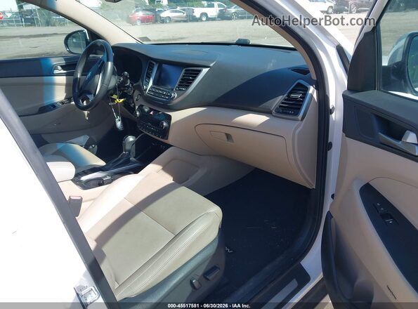 KM8J33A28HU303377 2017 HYUNDAI TUCSON White Widok wnętrza z przodu