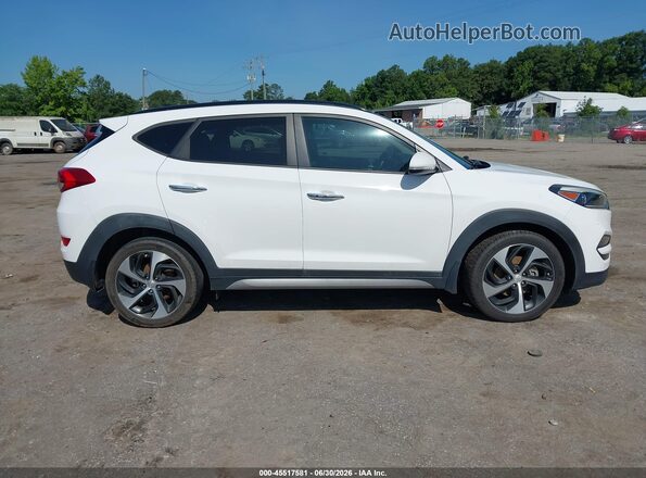 KM8J33A28HU303377 2017 HYUNDAI TUCSON White Widok wnętrza z tyłu
