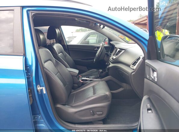 KM8J33A29GU185547 2016 HYUNDAI TUCSON Blue Widok wnętrza z przodu