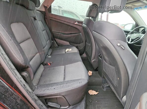 KM8J33A2XHU579964 2017 HYUNDAI TUCSON Black Rear seats view