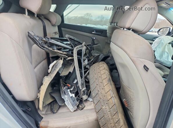 KM8J33A40GU100421 2016 HYUNDAI TUCSON Silver უკანა სალონის ხედი