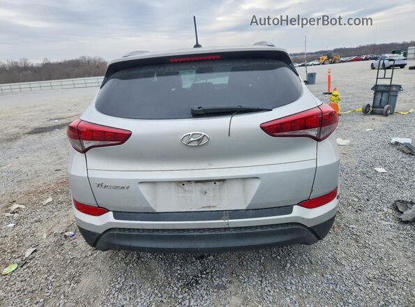 KM8J33A40GU100421 2016 HYUNDAI TUCSON Silver უკანა ხედი