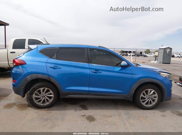 KM8J33A40GU186507 2016 HYUNDAI TUCSON Синий Вид задней части салона