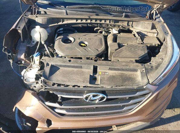 KM8J33A41GU032100 2016 HYUNDAI TUCSON Brown Widok z tyłu