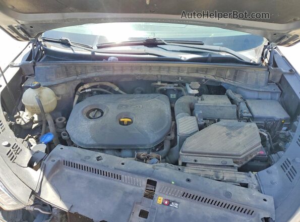 KM8J33A41GU105174 2016 HYUNDAI TUCSON Gray Vista del compartimento del motor