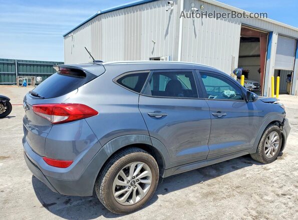 KM8J33A41GU105174 2016 HYUNDAI TUCSON Gray Trasero derecho