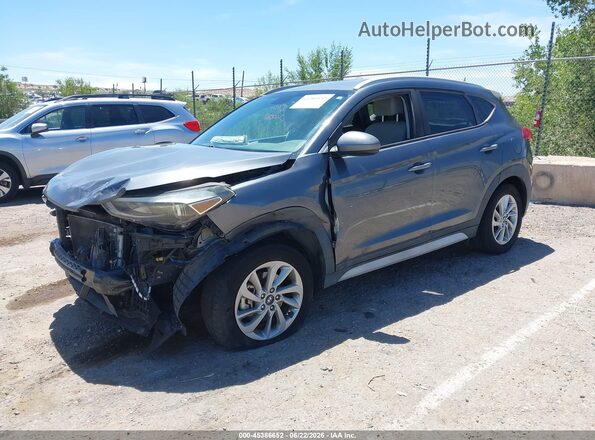 KM8J33A41HU401524 2017 HYUNDAI TUCSON Gray Vista tres cuartos delantera izquierda