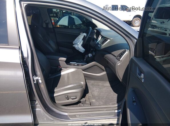KM8J33A41HU514082 2017 HYUNDAI TUCSON Gray წინა სალონის ხედი