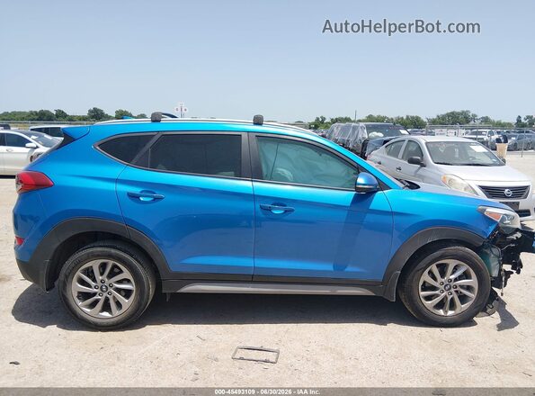 KM8J33A41JU735686 2018 HYUNDAI TUCSON Blue Widok wnętrza z tyłu