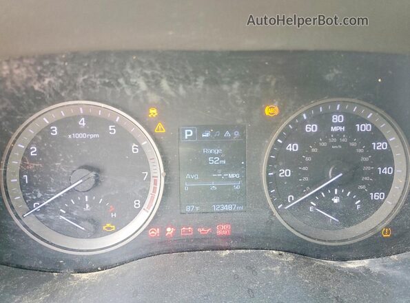 KM8J33A42GU076252 2016 HYUNDAI TUCSON Charcoal ხელსაწყოთა პანელის ხედი