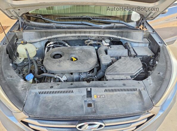 KM8J33A42GU076252 2016 HYUNDAI TUCSON Charcoal უკანა სალონის ხედი