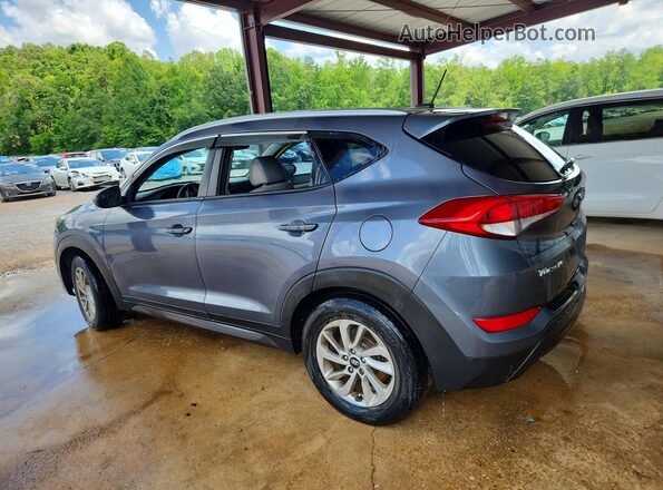 KM8J33A42GU076252 2016 HYUNDAI TUCSON Charcoal უკანა მარცხენა