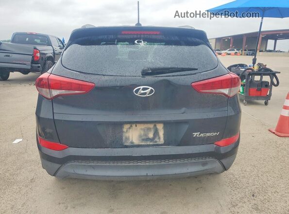 KM8J33A44GU212445 2016 HYUNDAI TUCSON Black Հետևի տեսք