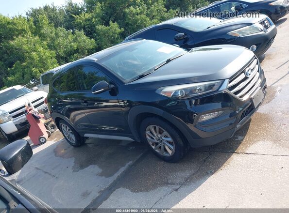 KM8J33A44HU539249 2017 HYUNDAI TUCSON Черный Вид задней части салона