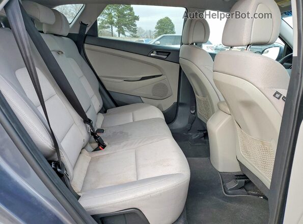 KM8J33A44JU666606 2018 HYUNDAI TUCSON Gray Սալոնի հետևի տեսք