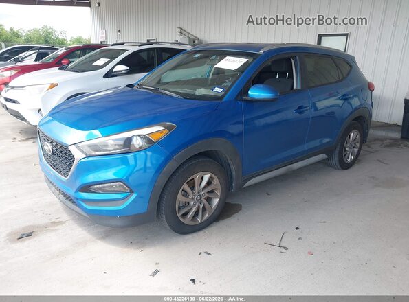 KM8J33A44JU689822 2018 HYUNDAI TUCSON Blue წინა მარცხენა ხედი სამი მეოთხედიდან