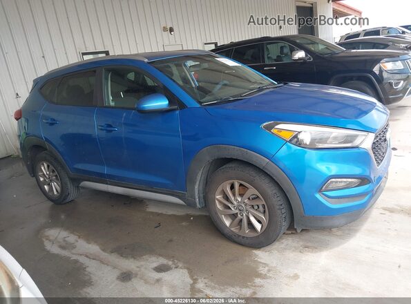 KM8J33A44JU689822 2018 HYUNDAI TUCSON Blue უკანა სალონის ხედი