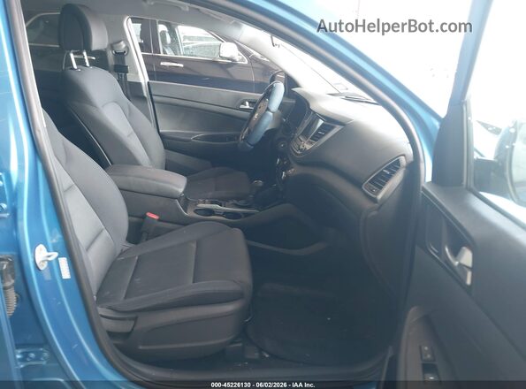 KM8J33A44JU689822 2018 HYUNDAI TUCSON Blue წინა სალონის ხედი