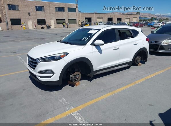 KM8J33A44JU695121 2018 HYUNDAI TUCSON White წინა მარცხენა ხედი სამი მეოთხედიდან
