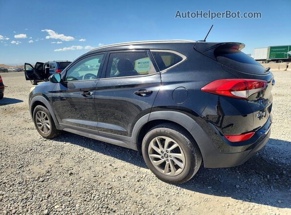 KM8J33A46GU060183 2016 HYUNDAI TUCSON Black Trasero izquierdo