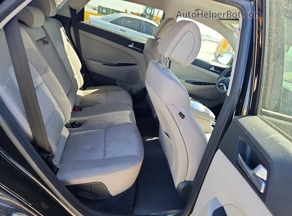 KM8J33A46GU060183 2016 HYUNDAI TUCSON Black Vista interior trasera