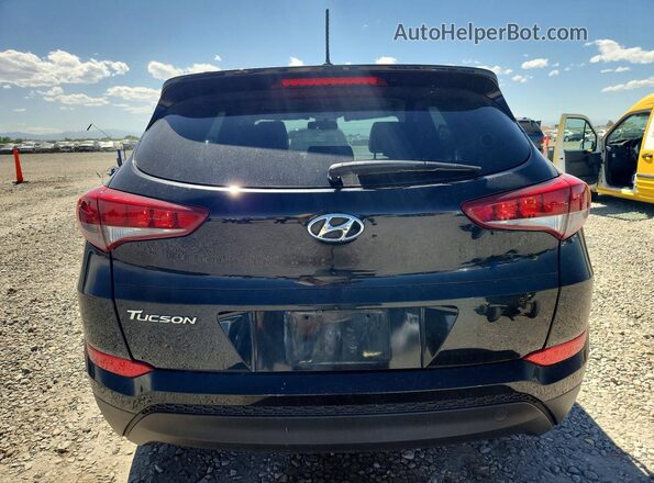 KM8J33A46GU060183 2016 HYUNDAI TUCSON Black Vista trasera