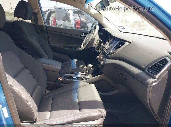 KM8J33A46GU071684 2016 HYUNDAI TUCSON Blue წინა სალონის ხედი