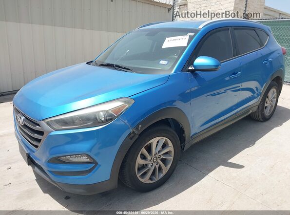 KM8J33A46GU071684 2016 HYUNDAI TUCSON Blue წინა მარცხენა ხედი სამი მეოთხედიდან