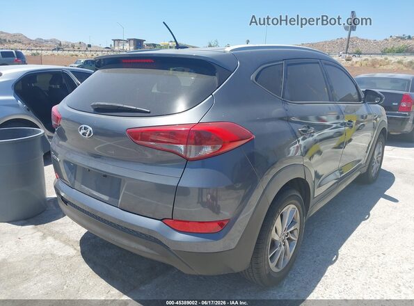 KM8J33A46GU090266 2016 HYUNDAI TUCSON Gray Trasero derecho