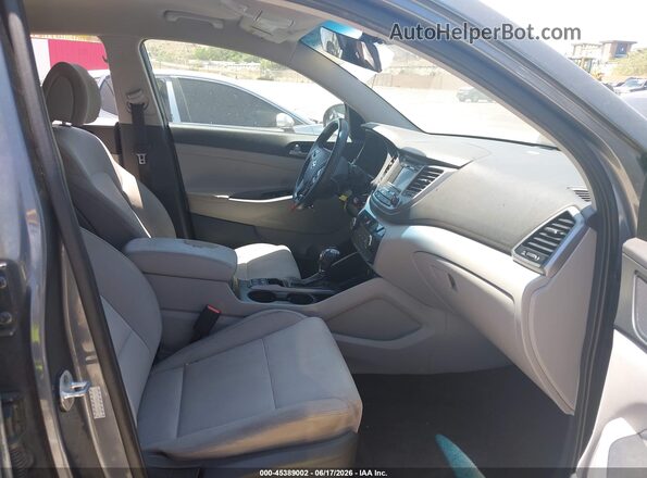 KM8J33A46GU090266 2016 HYUNDAI TUCSON Gray Vista interior delantera