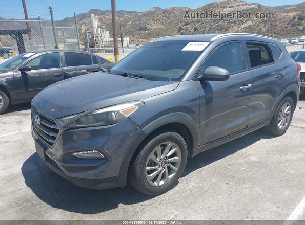 KM8J33A46GU090266 2016 HYUNDAI TUCSON Gray Vista tres cuartos delantera izquierda