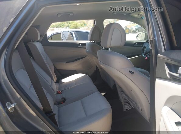 KM8J33A46GU090266 2016 HYUNDAI TUCSON Gray Vista de la etiqueta del VIN