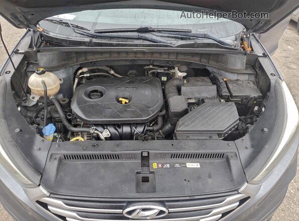 KM8J33A48HU439736 2017 HYUNDAI TUCSON Gray Vista del compartimento del motor