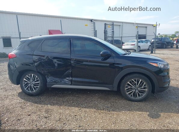 KM8J33AL0MU373930 2021 HYUNDAI TUCSON Black Widok wnętrza z tyłu