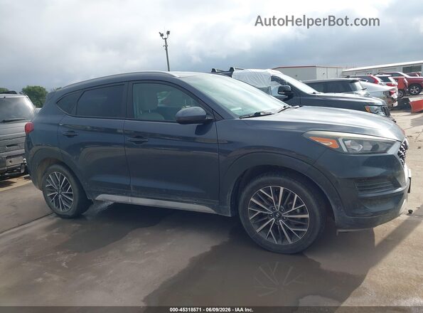 KM8J33AL2LU208864 2020 HYUNDAI TUCSON Blue Սալոնի հետևի տեսք