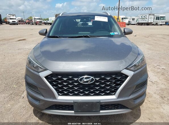 KM8J33AL2MU362816 2021 HYUNDAI TUCSON Silver Rear interior view