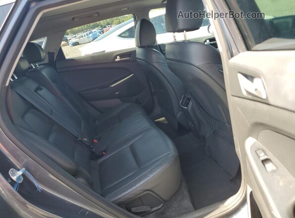 KM8J33AL4KU022385 2019 HYUNDAI TUCSON Charcoal Սալոնի հետևի տեսք