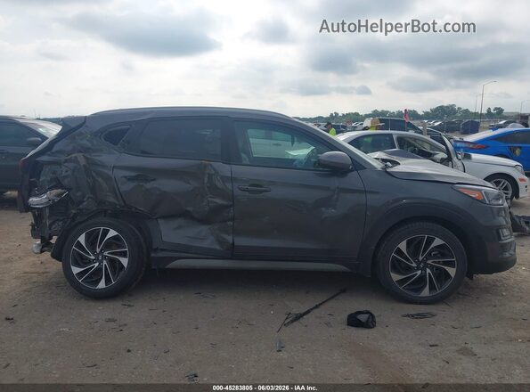 KM8J33AL4LU276972 2020 HYUNDAI TUCSON Gray Rear interior view