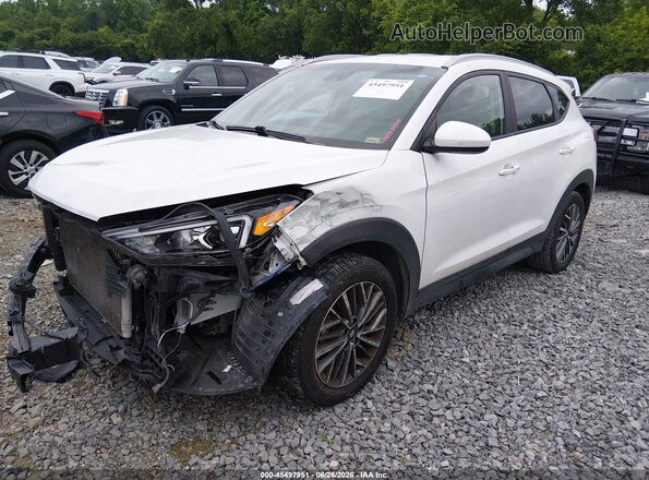 KM8J33AL6KU064962 2019 HYUNDAI TUCSON White წინა მარცხენა ხედი სამი მეოთხედიდან
