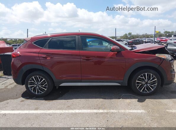 KM8J33AL8LU122183 2020 HYUNDAI TUCSON Burgundy Rear interior view