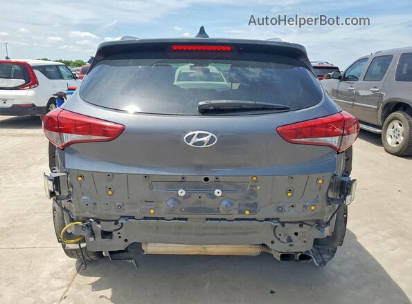 KM8J33ALXJU745592 2018 HYUNDAI TUCSON Gray Vista trasera