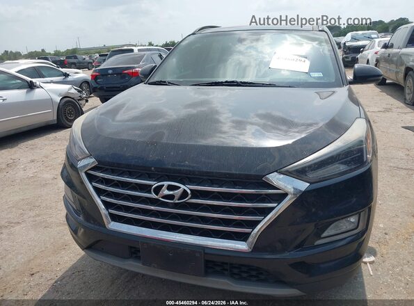 KM8J33ALXMU312228 2021 HYUNDAI TUCSON Black Vista interior trasera