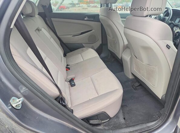 KM8J3CA22GU227475 2016 HYUNDAI TUCSON Синий Вид задней части салона